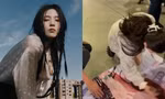 Han So Hee khiến fan Thái "tan chảy" vì không ngại quỳ gối ký tên cho người hâm mộ tại sân bay