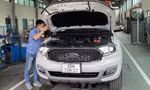 Kiểm định lần đầu ô tô mới tại Trung tâm Ðăng kiểm Mỹ Ðình (Nam Từ Liêm, Hà Nội). Ảnh: Ngọc Mai