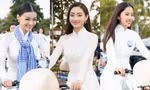 Hoa hậu Lương Thùy Linh, Kiều Loan đẹp tinh khôi như nữ sinh, đạp xe với áo dài trắng