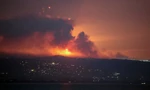 Khu vực miền nam Li-băng sáng rực trong cuộc tấn công của Israel sáng sớm 25/8. (Ảnh: Reuters)