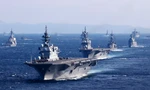 Tàu JS Izumo và các tàu chiến khác của Nhật Bản tham gia một chương trình ở Vịnh Sagami năm 2022. (Ảnh: Kyodo)
