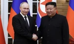 Tổng thống Nga Vladimir Putin và Chủ tịch Triều Tiên Kim Jong Un trong cuộc gặp ngày 19/6. (Ảnh: Reuters)
