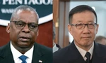 Bộ trưởng Quốc phòng Mỹ Lloyd Austin và người đồng cấp Trung Quốc Đổng Quân. (Ảnh: AP)