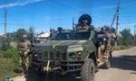 Xe của lực lượng an ninh Ukraine đi tuần ở Kupiansk, vùng Kharkiv, ngày 10/9