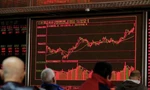 Bảng chỉ số chứng khoán ở Bắc Kinh ngày 2/1. (Ảnh: Reuters)