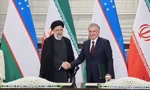 Tổng thống Uzbekistan Shavkat Mirziyoyev (phải) gặp người đồng cấp Iran Ebrahim Raisi trước thượng đỉnh SCO ngày 14/9. (Ảnh: Reuters) 