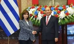 Chủ tịch nước Nguyễn Xuân Phúc đón Tổng thống Hy Lạp Katerina Sakellaropoulou ngày 16/5. (Ảnh: Anh Sơn) 