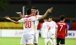 Văn Đức ăn mừng bàn thắng cùng Tiến Dũng. Ảnh: Getty.
