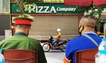 Nhân viên quán Pizza dương tính SARS-CoV-2, một đoạn phố ở Hà Nội bị phong toả