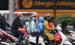 Đón gió mùa đông bắc, người dân Hà Nội đi làm đi học đầu tuần trong thời tiết lạnh