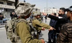 Cảnh tượng tan hoang ở Dải Gaza sau khi trúng bom của Israel. (Ảnh: Reuters)