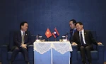 Chủ tịch nước Võ Văn Thưởng gặp Tổng Bí thư, Chủ tịch nước Lào Thongloun Sisoulith ngày 19/10 tại Bắc Kinh. (Ảnh: TTXVN)