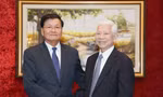 Tổng Bí thư, Chủ tịch nước Lào gặp gỡ các đồng chí nguyên Chủ tịch nước Nguyễn Minh Triết và Trương Tấn Sang