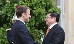 Thủ tướng Chính phủ Phạm Minh Chính và Tổng thống Cộng hòa Pháp Emmanuel Macron. (Ảnh: Dương Giang/TTXVN)