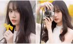 Nữ sinh đắm chìm trong vẻ đẹp hoa Phong Linh