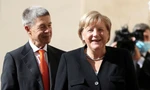 Thủ tướng Đức Angela Merkel và Phu quân. (Ảnh: Reuters)