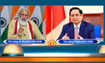 Thủ tướng Phạm Minh Chính (phải) và Thủ tướng Ấn Độ Narendra Modi. (Ảnh: Mofa)