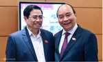 Chủ tịch nước Nguyễn Xuân Phúc (phải) và Thủ tướng Phạm Minh Chính. (Ảnh: VNE)