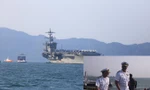 Tàu sân bay Mỹ USS Carl Vinson neo tại vịnh Đà Nẵng (ảnh lớn). Chuẩn Đô đốc John Fuller (phải) và Phó đô đốc Phillip Sawyer dạo trên cảng Tiên Sa (ảnh nhỏ). Ảnh: Nguyễn Thành.