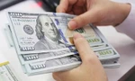 Ngân hàng Nhà nước tăng giá bán USD lần thứ 3 trong tháng