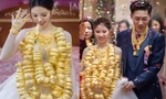 Trung Quốc: Cô dâu 'gây sốt' khi đeo 100 chiếc vòng vàng nặng trĩu cổ trong đám cưới