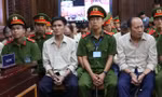 Các bị cáo tại phiên tòa sáng nay 29/7. Ảnh: Tân Châu.