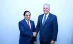 Thủ tướng Phạm Minh Chính có cuộc hội kiến Bí thư thứ nhất, Chủ tịch nước Cuba Miguel Diaz Canel. Ảnh: TTXVN