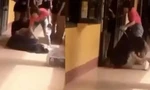 Cô giáo kéo lê học sinh (Ảnh cắt từ Clip)