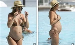 Cựu Hoa hậu Anh diện bikini khoe bụng bầu 'vượt mặt' 
