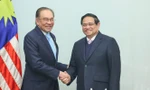 Thủ tướng Phạm Minh Chính và Thủ tướng Malaysia Anwar Ibrahim sáng 26/2. (Ảnh: Như Ý)