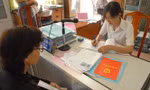 TPHCM giao chi nhánh Văn phòng đăng ký đất đai các quận huyện cấp sổ đỏ cho người dân.