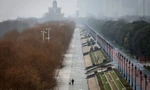 Thành phố Vũ Hán trong những ngày phong tỏa nghiêm ngặt cách đây gần một năm. Ảnh: Getty.