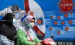 Dịch COVID-19 đang nhấn chìm Indonesia. Ảnh: AP