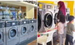 Mẹ mải nghe điện thoại, con trai đùa nghịch đẩy luôn em gái vào máy giặt