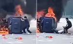 Trung Quốc: Một người dùng tay không giật bung cửa ô tô bị cháy để cứu người