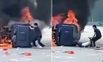 Trung Quốc: Một người dùng tay không giật bung cửa ô tô bị cháy để cứu người