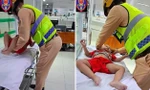 CSGT dùng xe đặc chủng 'mở đường' đưa cháu bé sốt co giật trên cao tốc đến bệnh viện