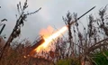 Bệ phóng rocket đa nòng Grad của Nga bắn về phía vị trí của Ukraine tại địa điểm không được công bố, ngày 12/11. (Ảnh: AP)