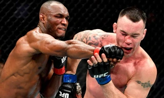 Kamaru Usman ra đòn trúng mặt Colby Covington.