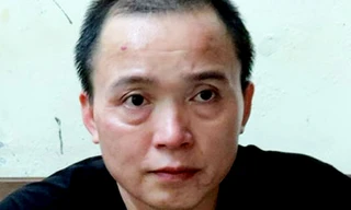 Nguyễn Thanh Sơn tại cơ quan công an - Ảnh :Toàn 