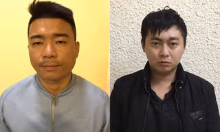 Giang (trái) và Toại tại cơ quan điều tra