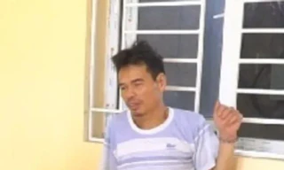 Đỗ Đình Tiến tại cơ quan công an