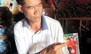 Anh Huy và tấm hình Vân Ánh chụp cùng bạn trong đội múa lân