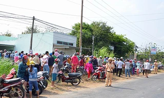 Công an tỉnh Trà Vinh phong toả, khám nghiệm hiện trường tại ngôi nhà xảy ra án mạng ở thị xã Duyên Hải. Ảnh: Công an cung cấp 