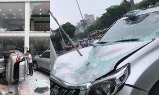 Nhân viên showroom lái ôtô lao từ tầng 2 xuống đất