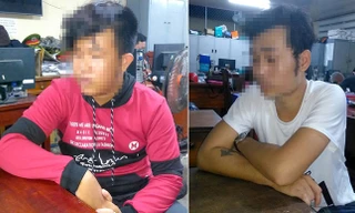 Nguyễn Đức Nhân (áo đỏ) và Lê Thanh H (áo trắng) tại cơ quan Công an.