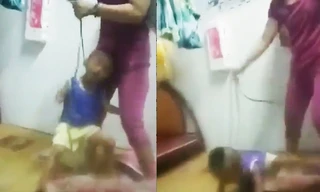 Tạm giữ người mẹ cột dây vào cổ con trai, bạo hành dã man