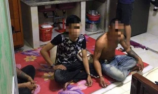 Các thanh niên xăm trổ giam lỏng cô gái để đòi nợ bị bắt giữ. Ảnh: Pháp luật TP Hồ Chí Minh