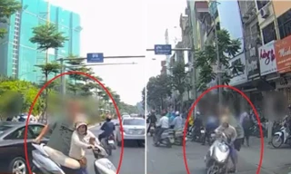 Tài xế nước ngoài lôi cả người và chiếc xe máy vào lề đường