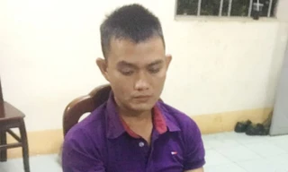 Nghi can Tình tại cơ quan Công an